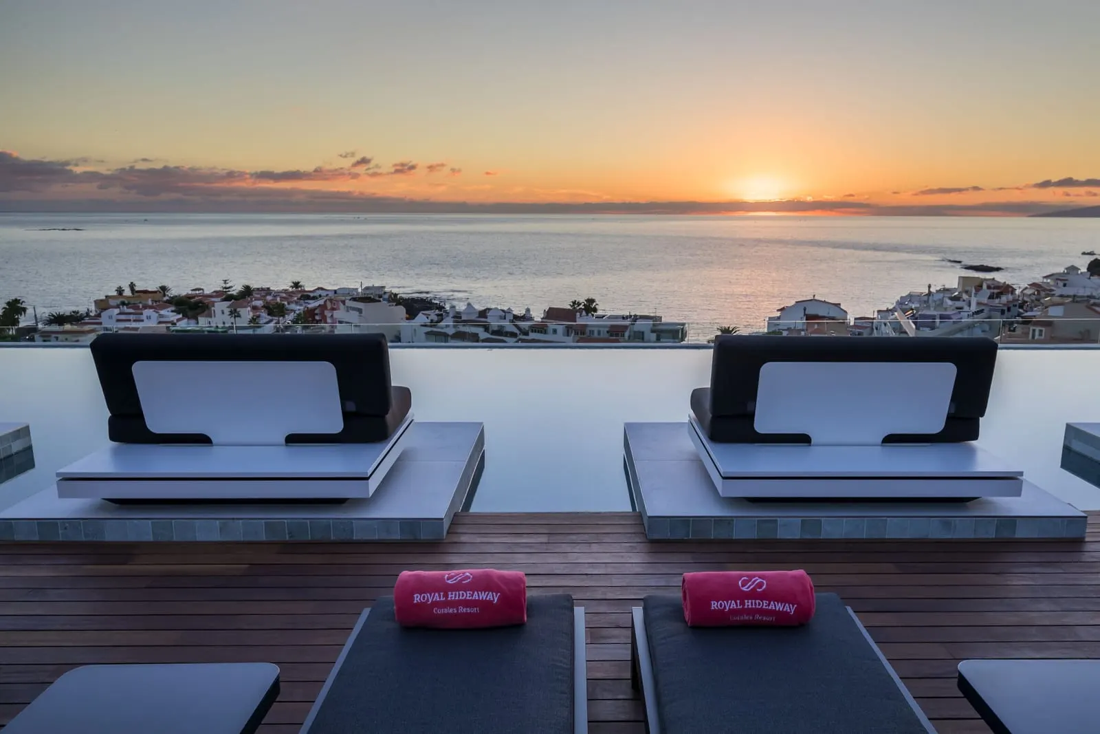 Royal Hideaway Corales Beach: Rooftop lounge beds at sunset